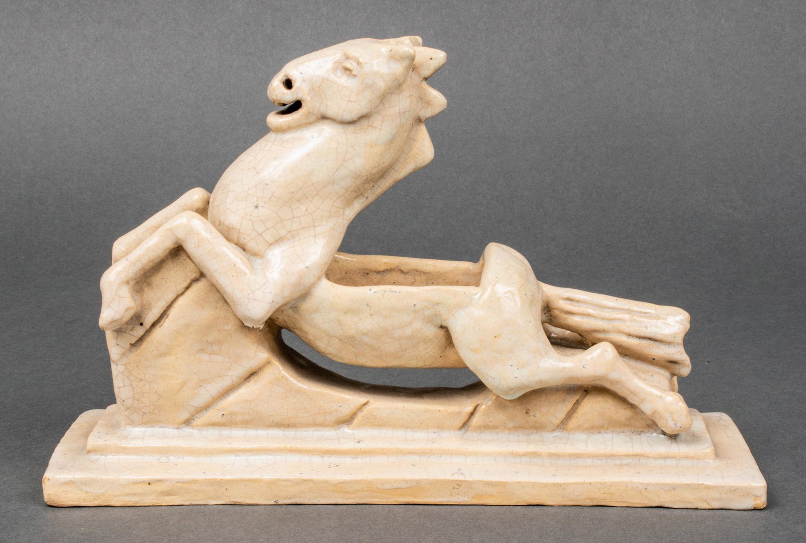 Lillie H. Harper "Pegasus" Pottery Horse Sculpture: Lillie H. Harper "Pegasus," pottery vessel sculpture depicting a rearing horse, bearing handwritten label underside. 6.75" H x 10.25" L x 3.25" D.