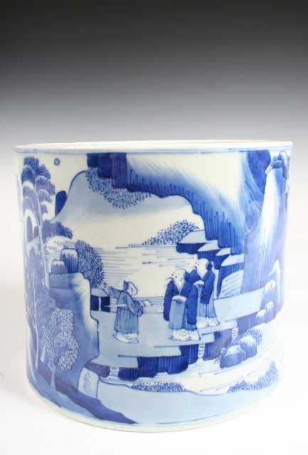 Chinese Blue-and-White Brushpot w/Landscape: Chinese blue-and-white porcelian brushpot decorated with 2 finely-painted narrative landscapes with expressive figures. Dimensions: 6-1/4"H x 7-3/8" diameter Condition: Occasional minor soiling and sc
