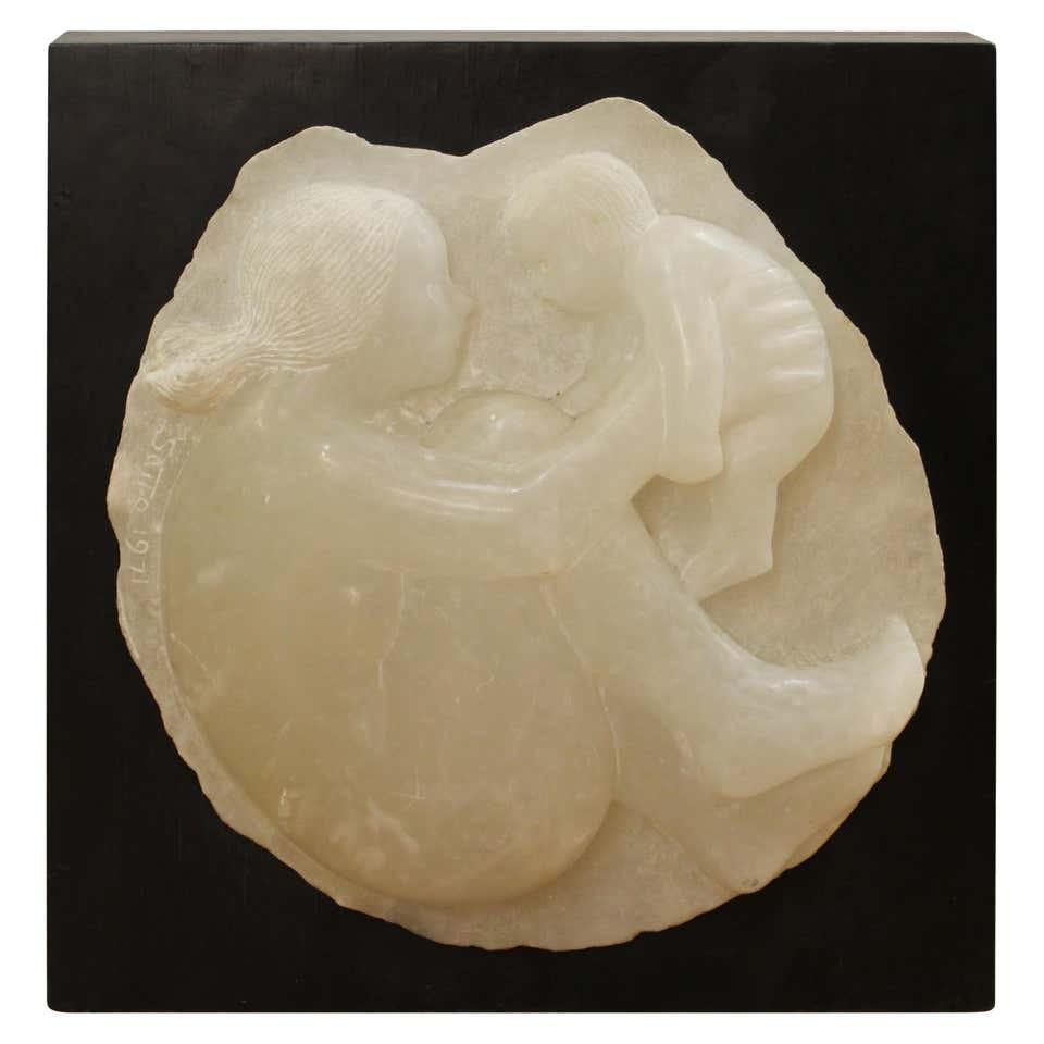 Seiji Saito Attr. Alabaster Bas-Relief Sculpture: Seiji Saito (Japanese, b. 1933) attributed "Mother and Child" alabaster bas-relief sculpture mounted to wood support, signed and dated: "Saito '97." Sculpture: 20" H x 18" W; overall: 22" H x 21" W x 