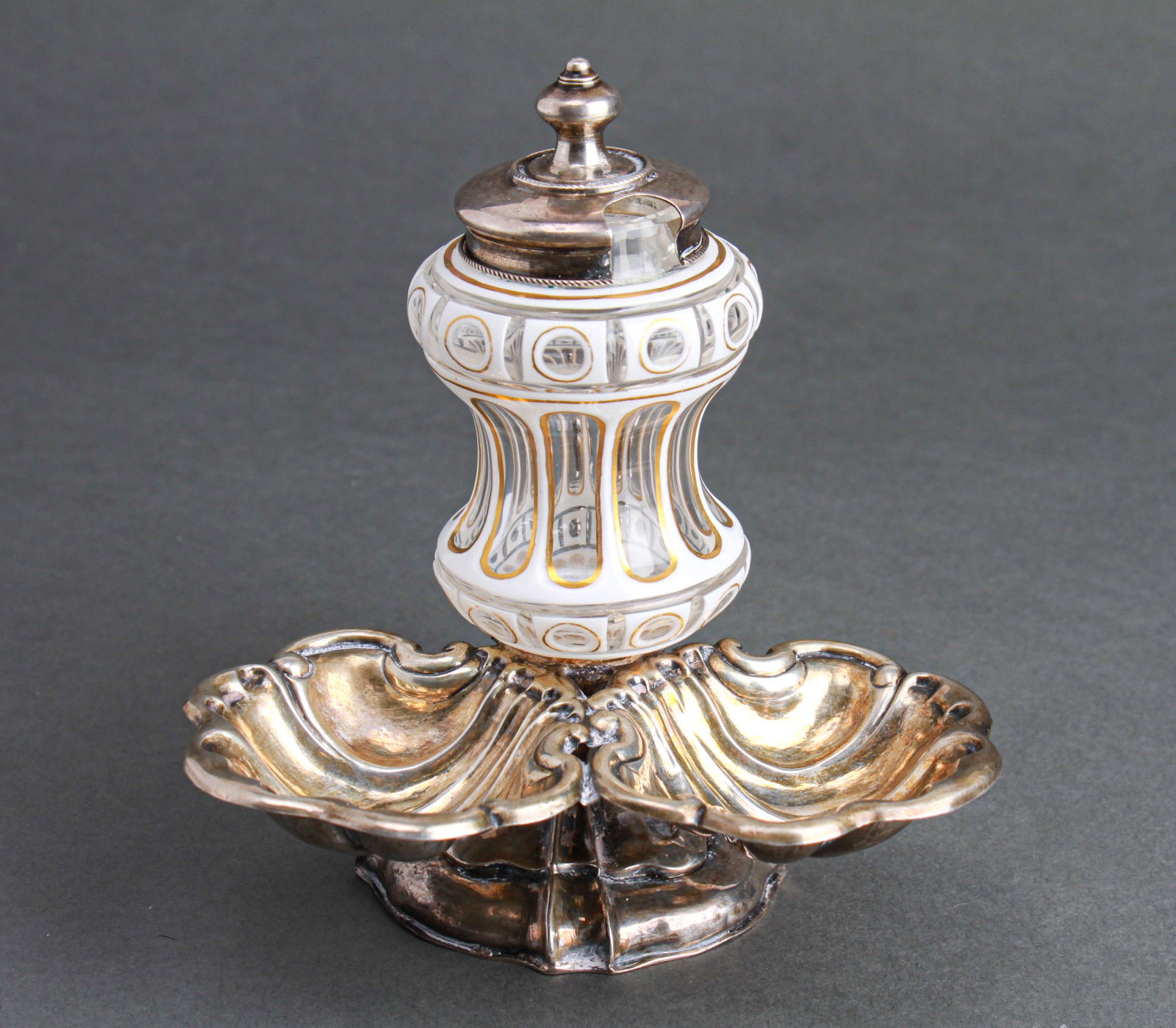 Bohemian Cased Glass & Silver-Plate Condiment: Silver-plate stand with Bohemian cased glass clear to white with gilt trim condiment. 5.5" H x 5.75" W including handle x 5" D.
