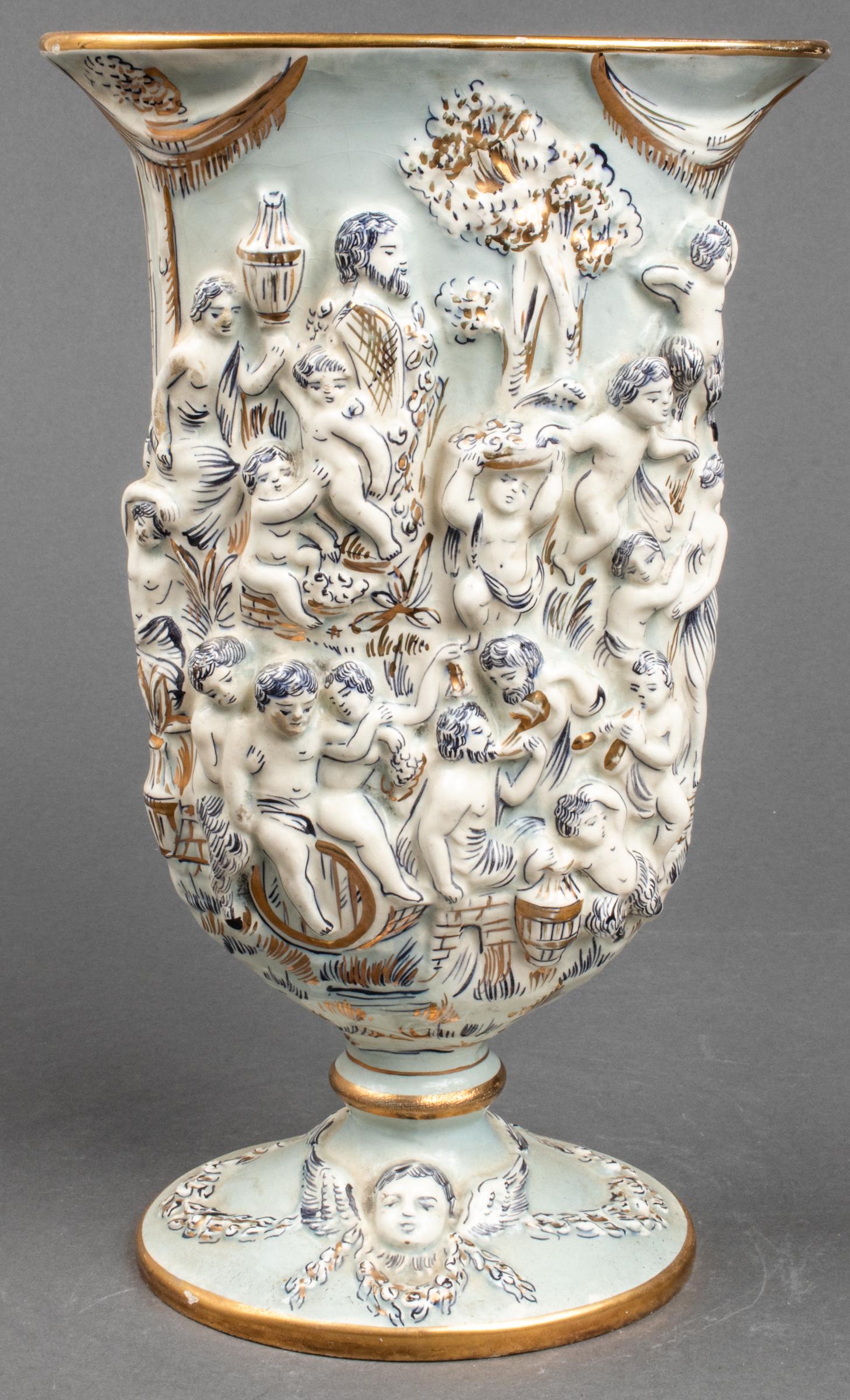 Italian Capodimonte Style Ardalt Capo Celeste Vase: Ardalt Capo Celeste Italian made vase on footed base with gilt trim featuring a relief motif of satyrs and cherub figures in a scene of revelry, Capodimonte style. Marked to the underside: "Ardalt Cap