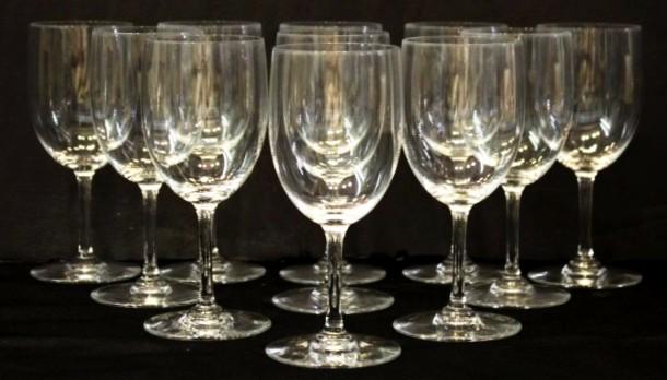 12 Baccarat Crystal White Wine Glasses: In the "Perfection" pattern, each marked with the Baccarat stamp on the bottom. 6.25" H.