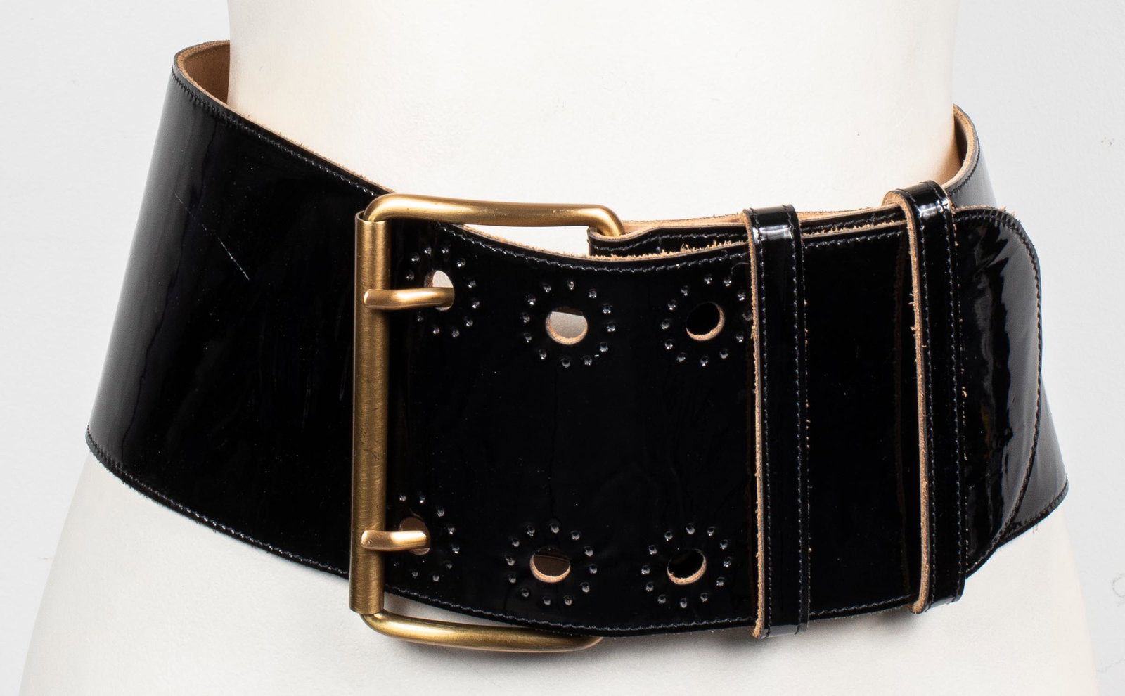 Carlos Falchi Wide Patent Leather Belt: Carlos Falchi wide patent leather belt with brass-tone buckle, designer's label "Carlos Falchi" and size "S" to interior. 38" L.