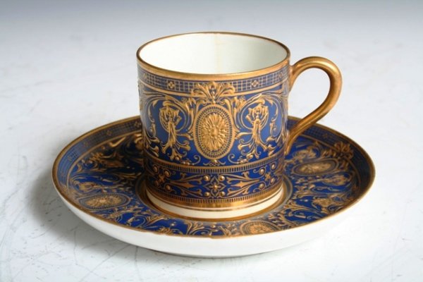 Tiffany & Co Royal Worcester Tea Cup & Saucer: Tiffany & Co and Royal Worcester, tea cup & saucer; marked.Dimensions: Cup, 2" x 2"; saucer, 4-1/4" diameter.
