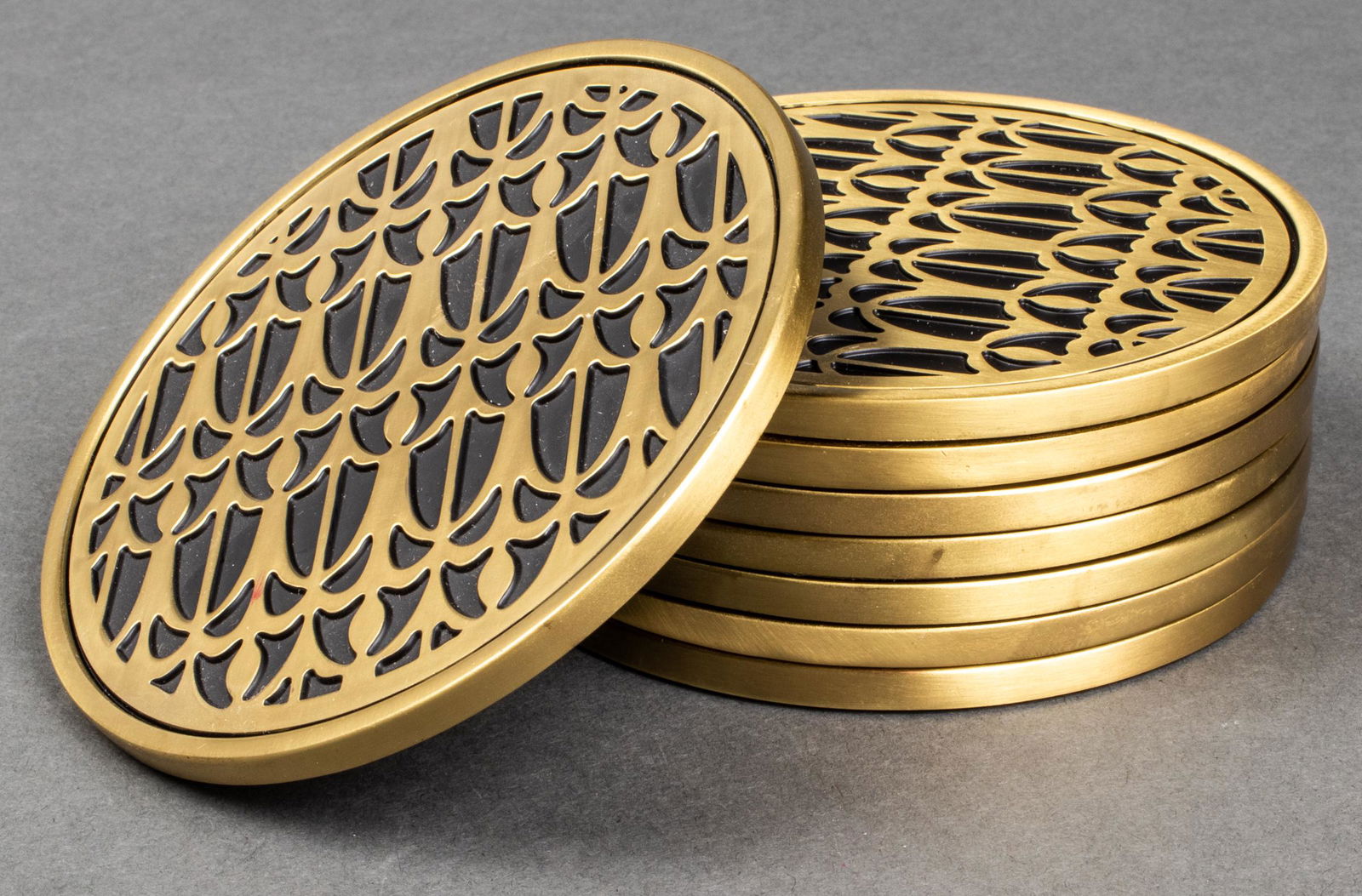 Fortuny L'Objet Gold-Tone "Venise" Coasters, 8: Set of eight Fortuny for L'Objet gold-tone coasters in the "Venise" pattern. 4.25" diameter. Provenance: Removed from a 157 East 57th Street estate.