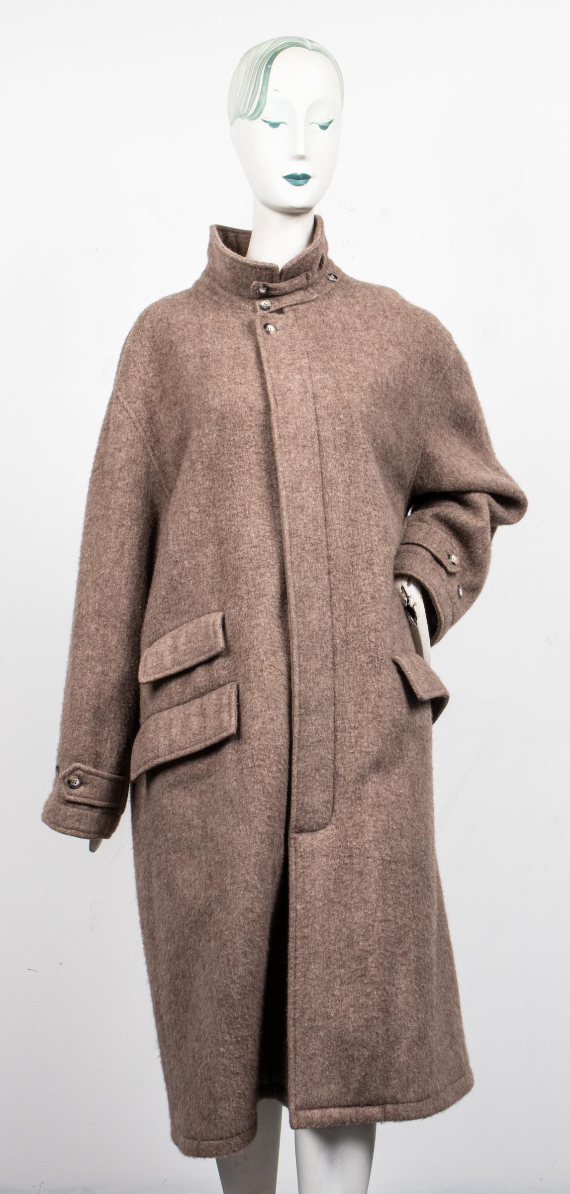 Faconnable Yak Hair Long Coat: Albert Goldberg for Faconnable overcoat, in taupe yak hair with flat collar over seven button 'hidden' front closure, the front with two slant pockets and a ticket pocket, single vent, the interior wi