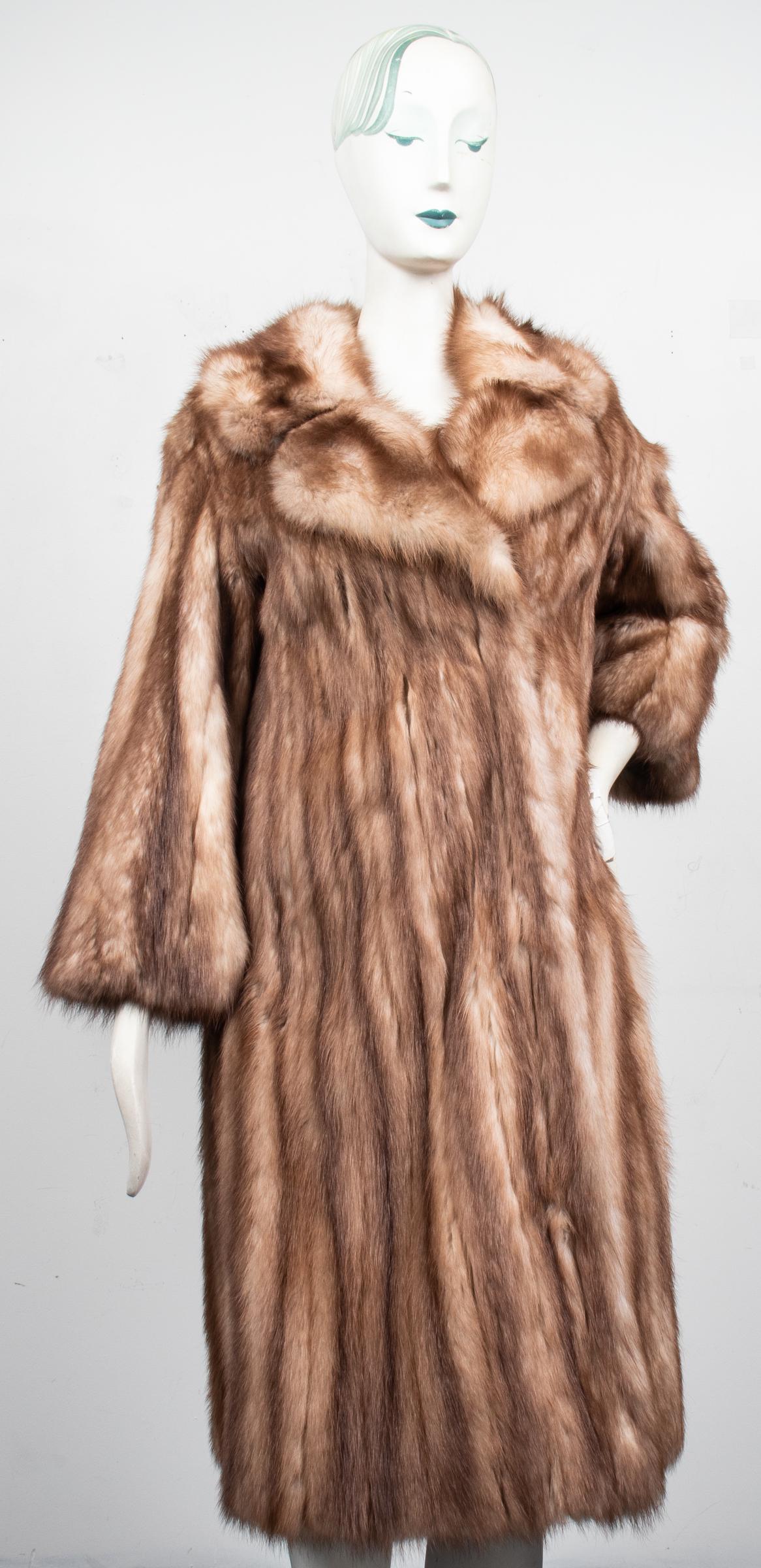 Fawn Mink Fur Coat: Fawn mink fur coat, the front with single button and three hook-and-loop closures, two seam pockets, the interior with taupe/grey satin lining and monogrammed "Mary H", lacking size and maker label. C