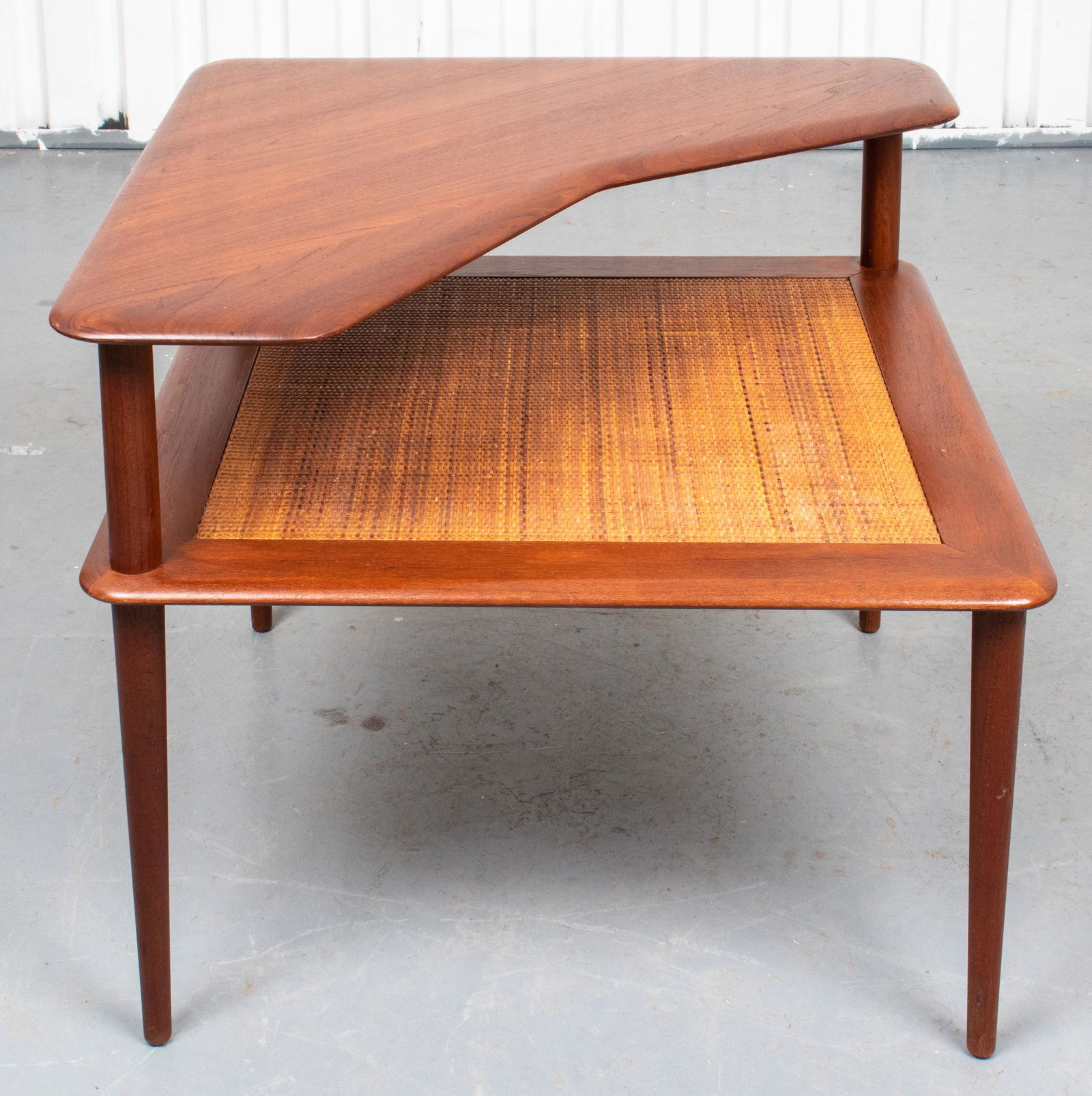 Finn Juhl John Stuart Danish Modern Corner Table: Finn Juhl for John Stuart Danish modern "Minerva" teak corner table, designed by Peter Hvidt and Orla Molgaard for France and Son, corner top tier over caned lower tier, maker's labels including for F