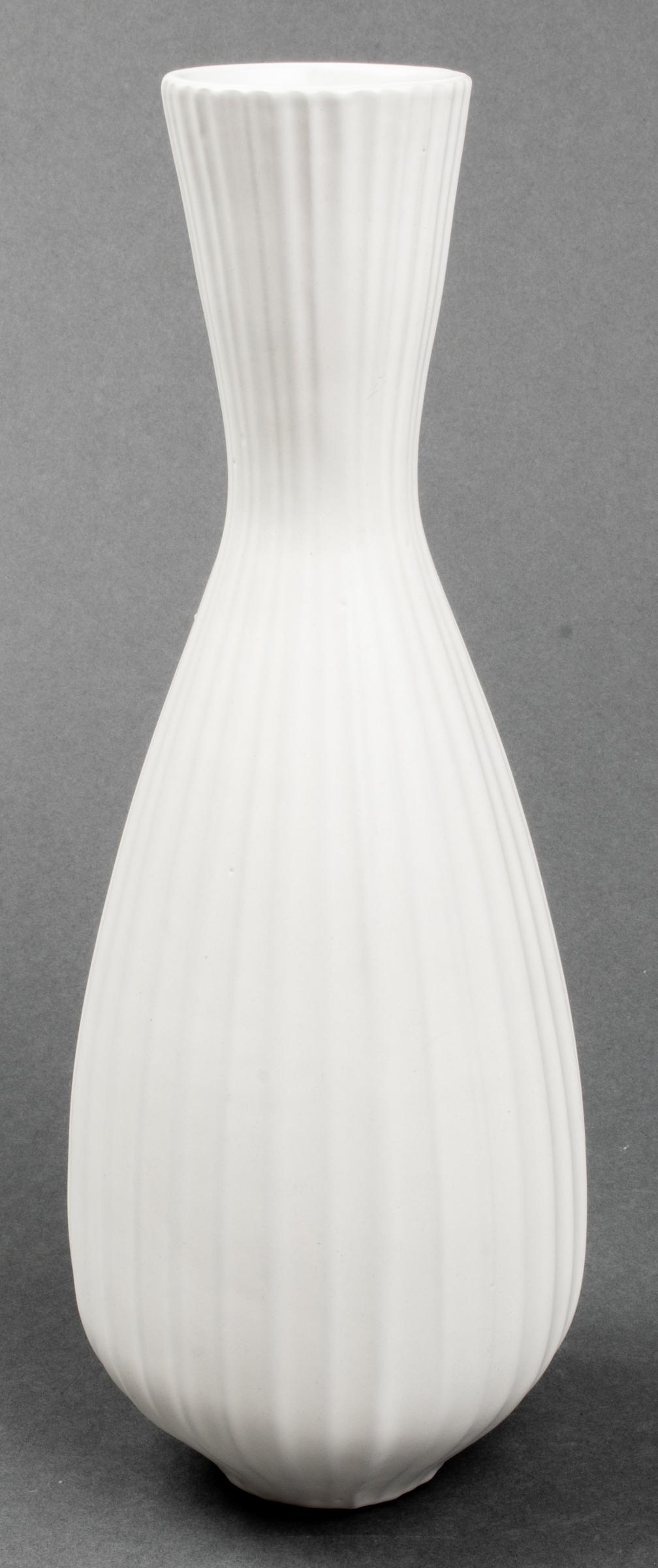 Vintage Jonathan Adler "Sven" Stoneware Vase: Jonathan Adler white stoneware "Sven" vase from the "Relief Collection," glazed with satin matte finish, maker's mark to underside. 13.25" H x 2.5" diameter. Provenance: Removed from a Kip's Bay colle