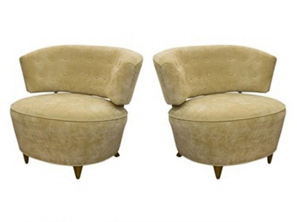 Pair of Gilbert Rohde Club Chairs ca. 1940s: Pair of club chairs with cushioned oval seats and curved backs with 2 wooden supports that become the rear legs by Modern- American designer Gilbert Rohde (1894-1944), ca. 1940s. Dimensions: Each 29&q