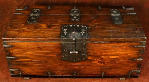 Korean Pine Coin Chest 19th-20th C.: Large wood coin chest displays a clean-cut grain texture and fine, hand-wrought ornamental ironwork, pine and iron, Korea, ca. late nineteenth or early twentieth century; unmarked. Dimensions: 15-1/4"