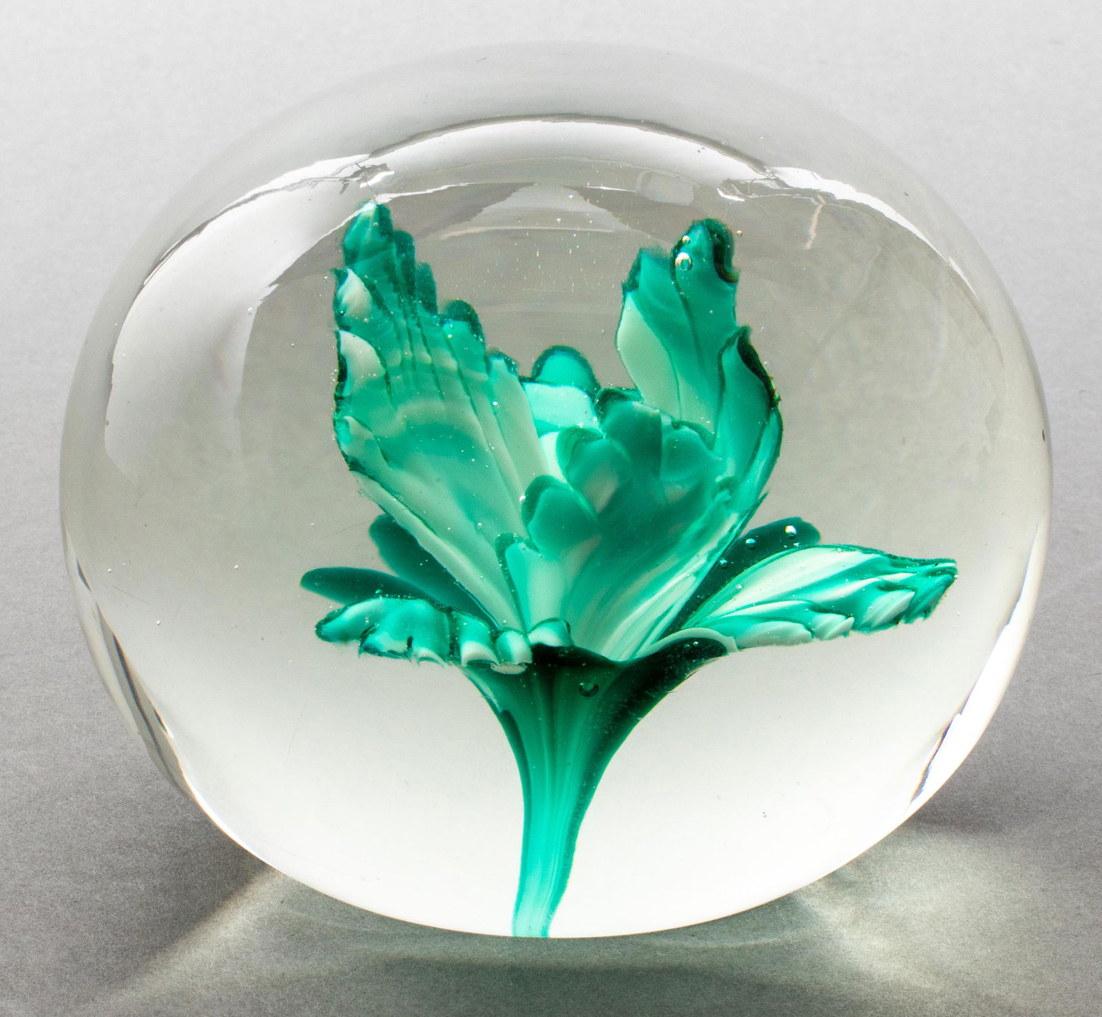 Art Glass Paperweight with Suspended Flower: Art glass paperweight with suspended flower motif, 4" H x 4" diameter.
