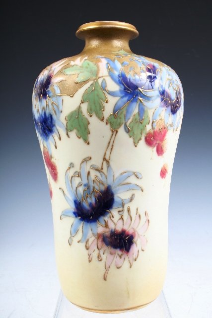 Turn-Teplitz Amphora Vase w/Flowers & Gilding: Amphora vase decorated with a floral motif and raised gilding, with gilded lip and base. Manufactured by Turn-Teplitz of Bohemia; marked and numbered on the bottom.Dimensions: Approximately 9-1/4"
