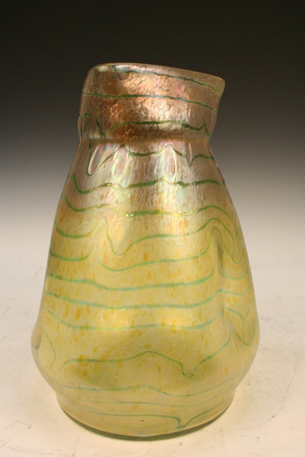 Loetz Nouveau Yellow-&-Green Iridescent Vase: Art-Nouveau-era iridescent yellow glass vase with green threading attributed to Loetz, ca. 1900; unsigned. Dimensions: 13"H x 8-1/2"diameter