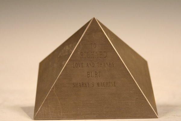 Tiffany & Co. Silver Geometric Engraved Desk Clock: Small, geometric-style desk clock engraved TO / RICHARD / LOVE AND THANKS, / FROM /BURT RENOLD / SHARKY'S MACHINE and made by Tiffany and Co., silver; marked with company logo on face and SWISS / 2217