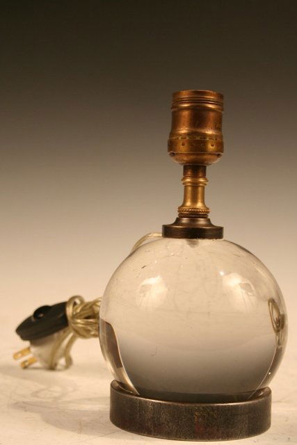 French Art Deco Spherical Glass Lamp by Adnet: Art deco lamp with spherical glass base sitting on a metal ring by Jacques Adnet (1900-1984), one socket with a switch-on electrical plug, France, ca. twentieth century; unmarked. Dimensions: 8"H x 4-