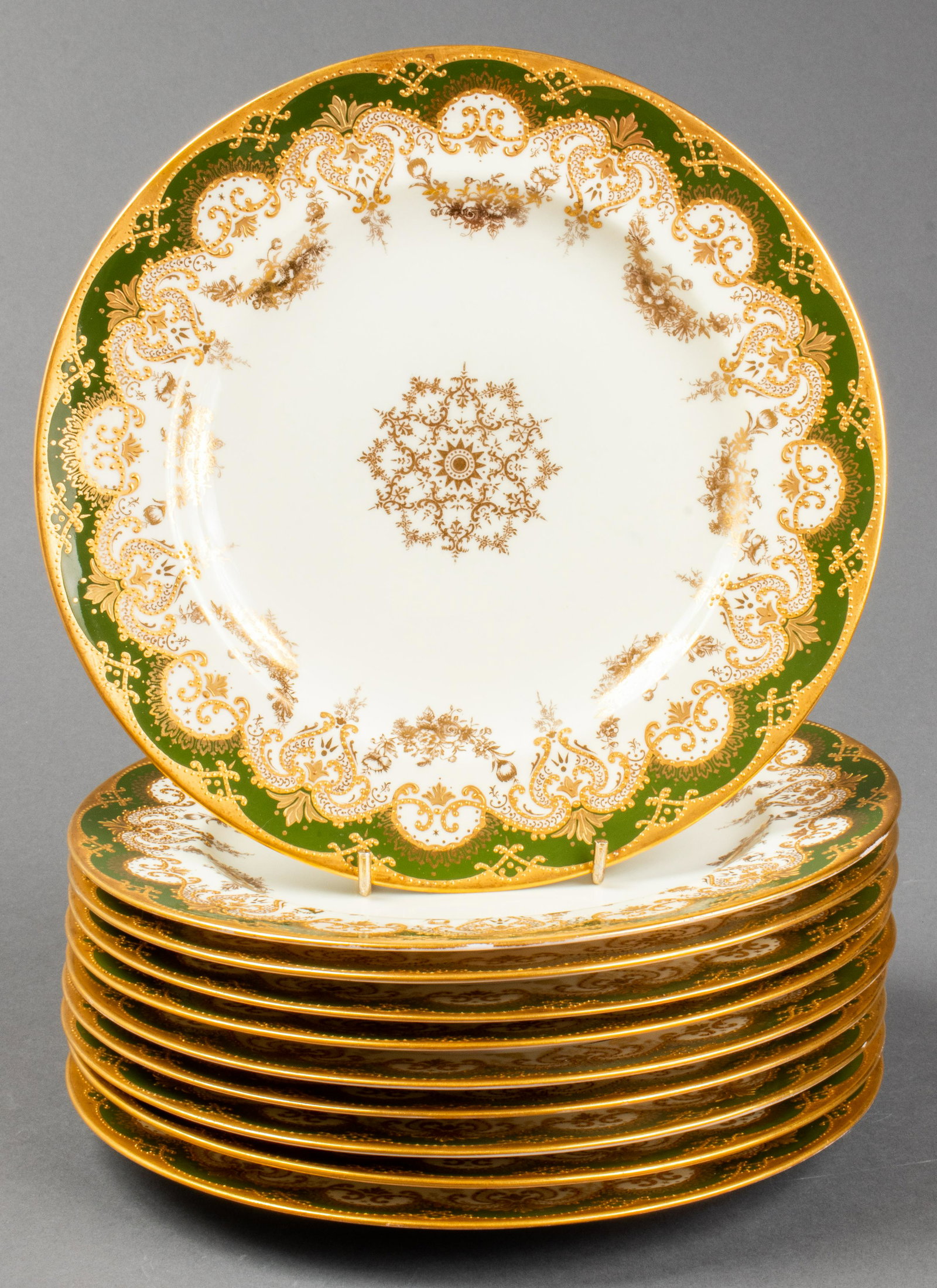 Spode for Tiffany & Co. Luncheon Plates, Set of 10: Copeland Spode for Tiffany & Co. porcelain luncheon plates, set of 10, ornately hand-decorated with green rims and gilt detailing, maker's and retailer's marks underside. 9" diameter.