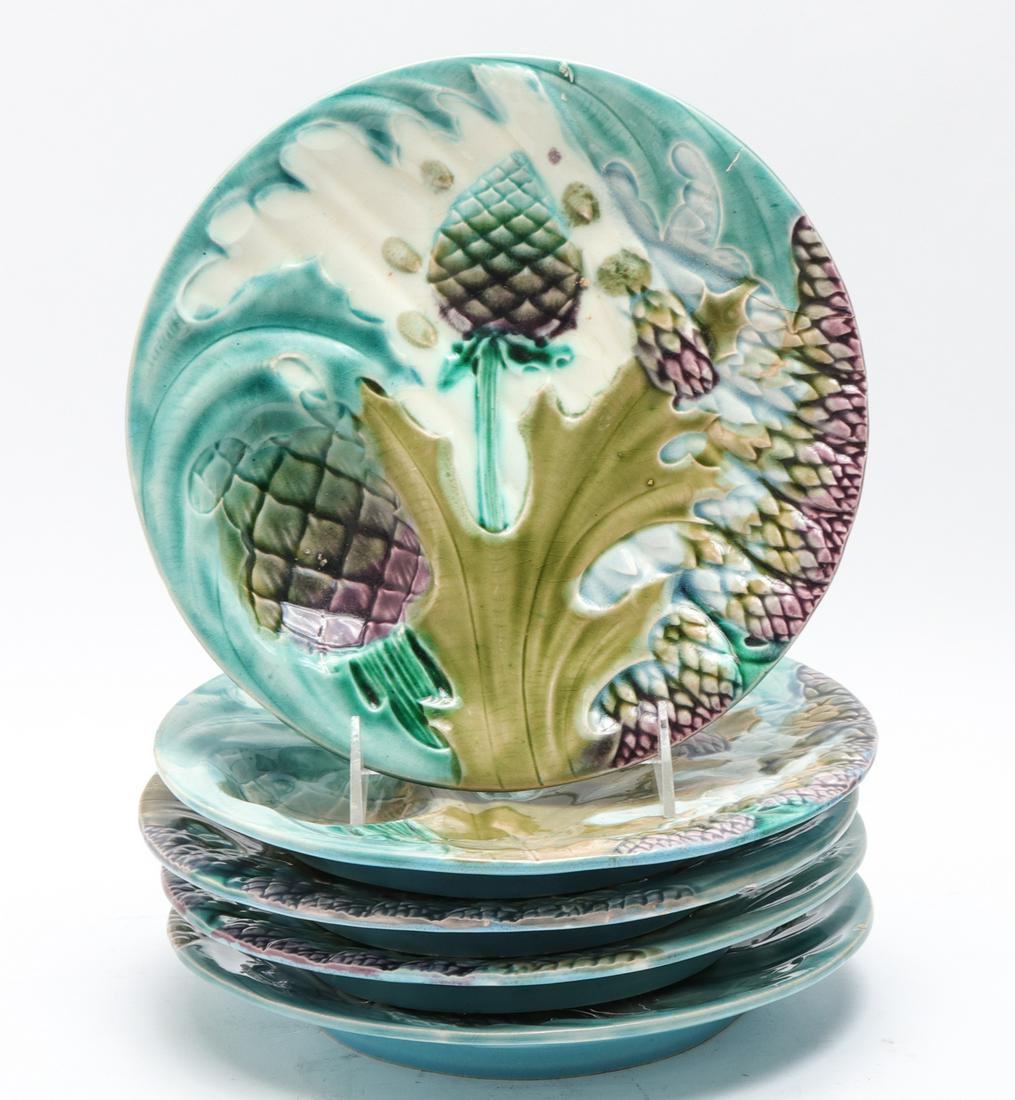 Luneville Majolica Artichoke & Asparagus Plates, 5: Set of five French majolica artichoke and asparagus plates with integral sauce reservoir and ringed foot, marked on bottom "Depose / K et G / Luneville" for Keller and Guerin, Luneville. 9" Diameter x