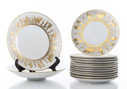 Arrigo Finzi Gilt Porcelain Greco-Roman Dishes, 14: Arrigo Finzi Italian mid-century modern parcel gilt porcelain dishes with Greco-Roman figural motifs and inscribed: "Sikon," 14 pieces comprising 12 plates and 2 chargers, marked underside: "Creazioni