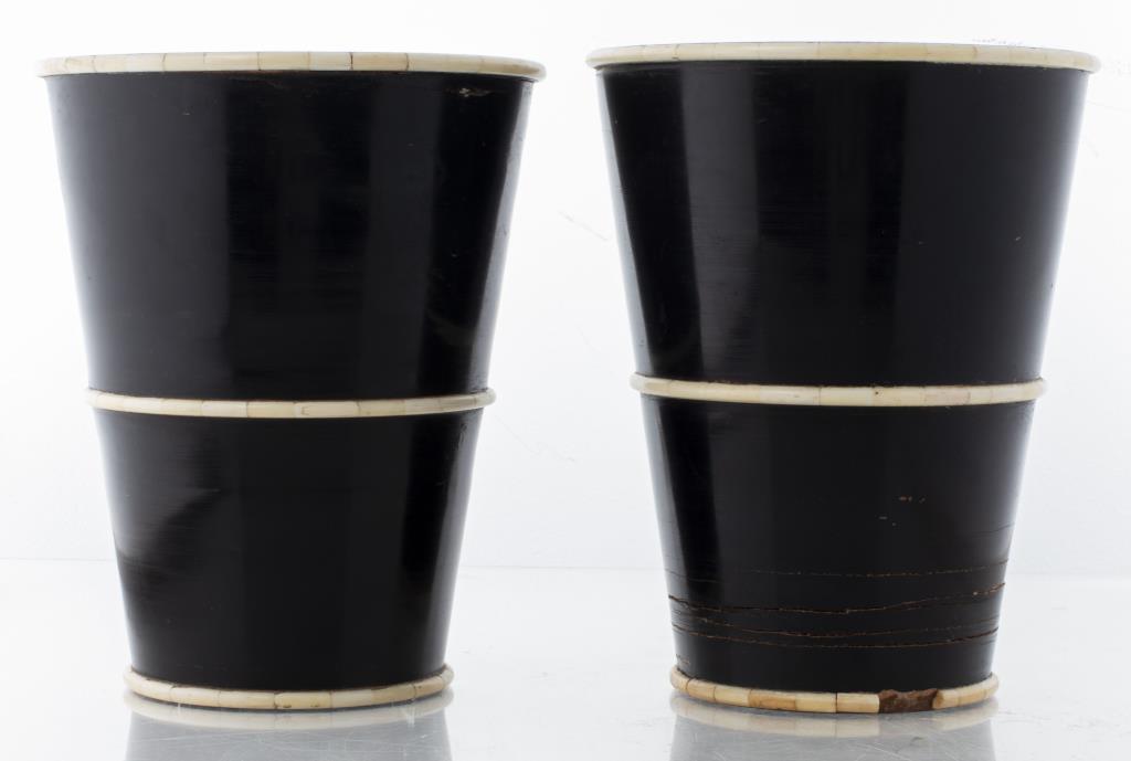 Carved Ebonized Wooden Pots, Pair: Pair of carved ebonized pots with applied bone borders, possibly African. 9.75” H x 8” diameter. Cracks.