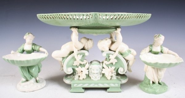 Minton 3-piece 19th-C Porcelain Table Service: British-made 3-piece Victorian-era porcelain table service by Minton decorated in white and light-green glazes. The set consists of an elongated central dish with basket-like piercing and Two (2) smal