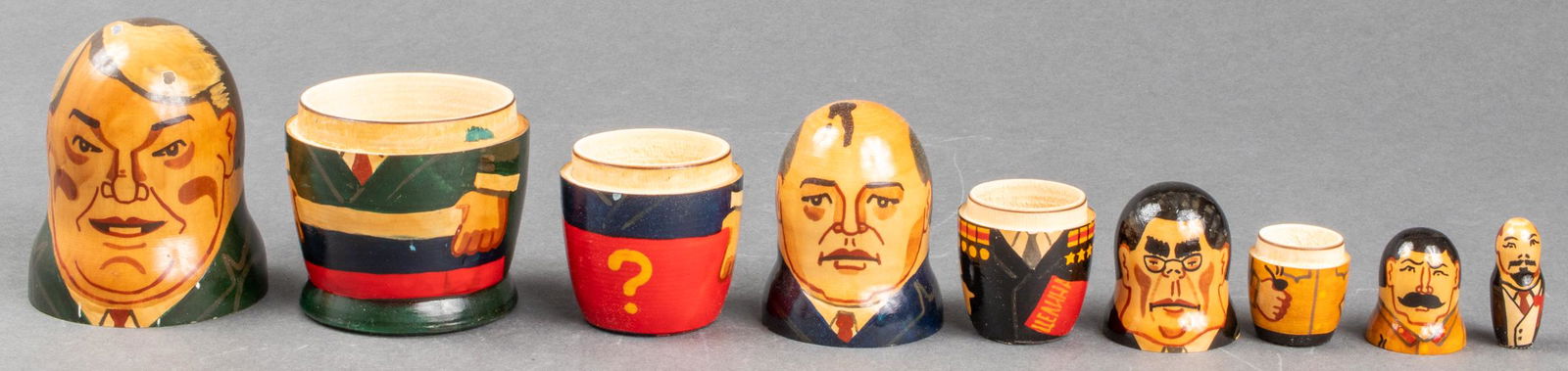 Russian Matryoshka Dolls of USSR Leaders, 5 Pcs.: A set of five Matryoshka nesting dolls of USSR / Russian leaders. 5.25" H. Chip to paint on largest doll noted.