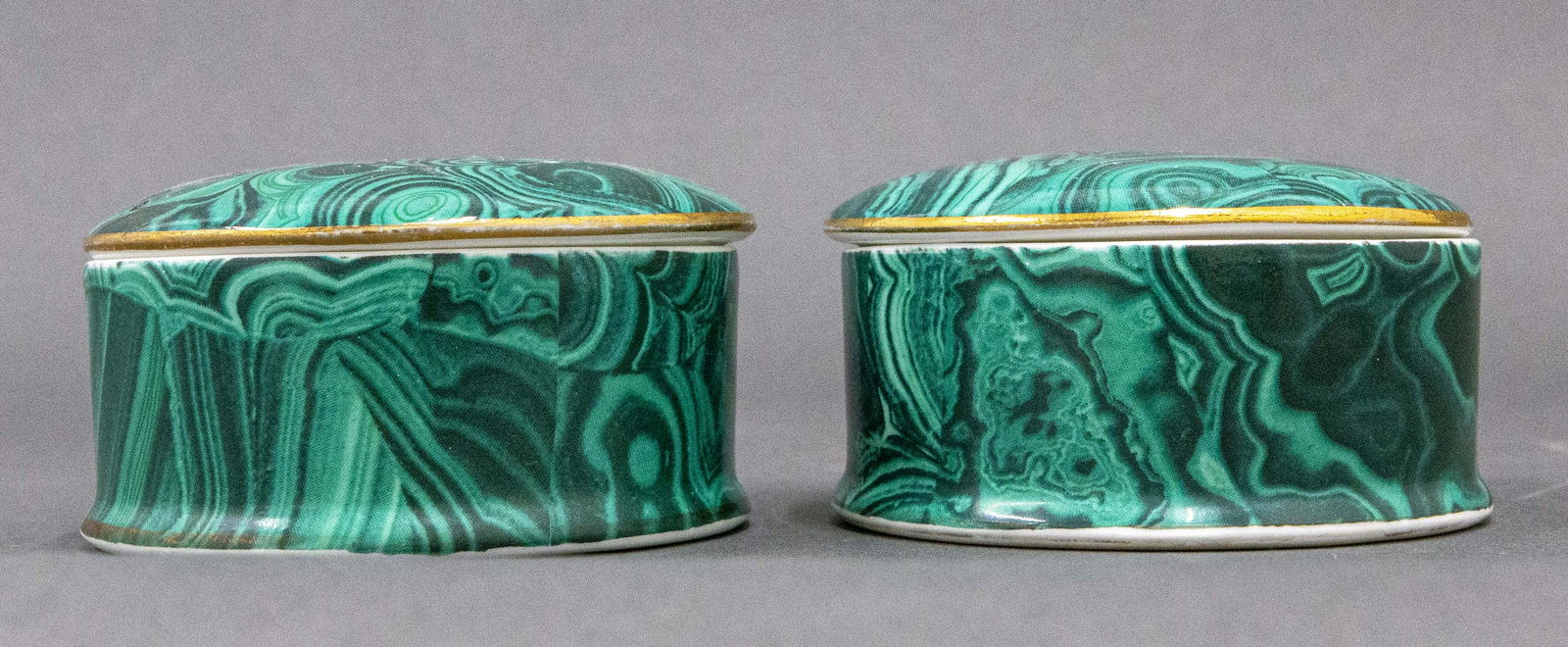 Malachite Pattern Porcelain Trinket Boxes: Two round porcelain covered trinket boxes, signed underside: "Royal Crown Duchy The H. Lexington Collection English Fine Bone China." 1.5" H x 3" diameter.