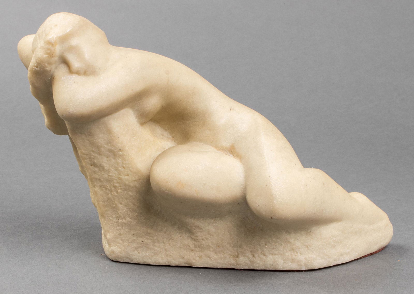 Vincent Glinsky "The Dreamer" Sculpture: Vincent Glinsky (Russian/American 1895-1975), "The Dreamer" resin sculpture of reclining nude woman. Signed "V. Glinsky" to base. 7" H x 9" L x 3.5" W.