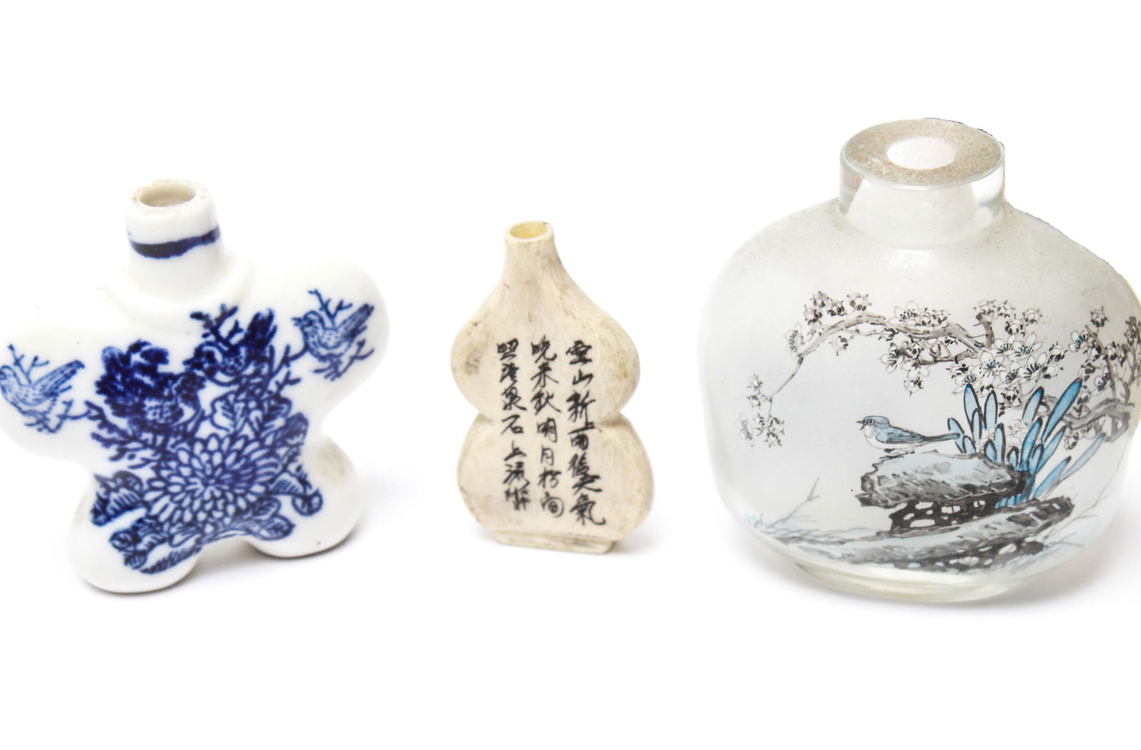 Chinese Chops & Snuff Bottles: Group of Chinese chops and snuff bottles, comprising hardstone, porcelain, reverse painted glass, and incised bone. Longest chop" 3.5" H; tallest bottle: 2.5" H. Chops with red ink to seal ends, bottl