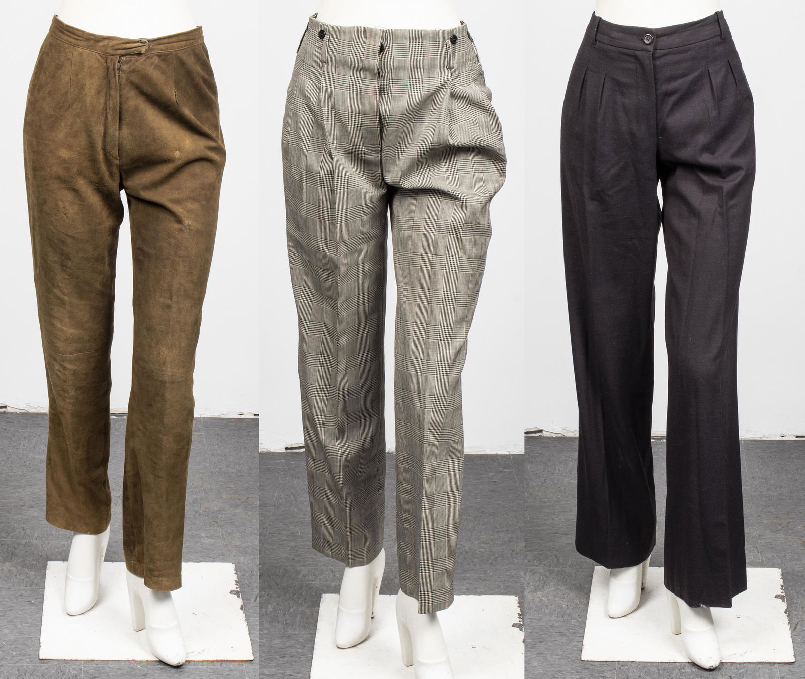 Yves Saint Laurent/Norma Kamali/Votre Nom Pants, 3: A trio of designer women's slacks, including Yves Saint Laurent Rive Gauche front pleated wool pants, approx. size M/L, waist 33", length from waist 44". Norma Kamali Omo Collection houndstooth print,