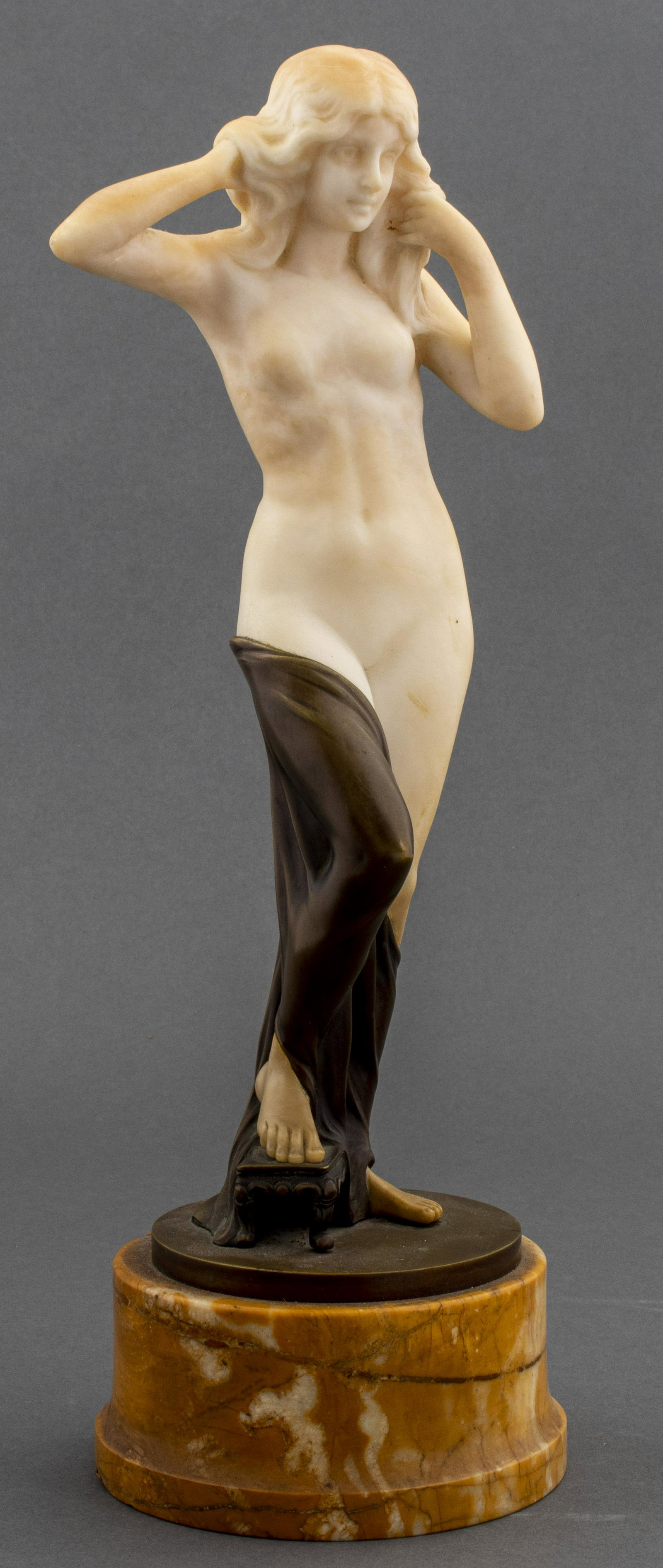 Vale Signed Art Deco Alabaster & Bronze Sculpture: Art Deco alabaster sculpture depicting nude female figure rendered in the Neoclassical taste with bronze mount modeled as loose draping to her legs, her foot raised on a stool, the bronze base signed 