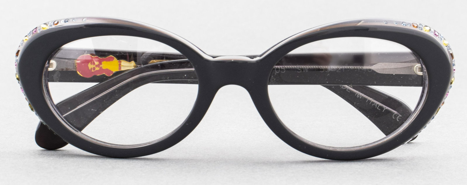 Patty Paillette Crystal Embellished Eyeglasses: Patty Paillette designer crystal embellished eyeglasses, inner arms marked "Ruby 05 SW 53*21 140" and "Patty Paillette Made in Italy" respectively. 1.75” H x 6” W x 5.5” D. Provenanc