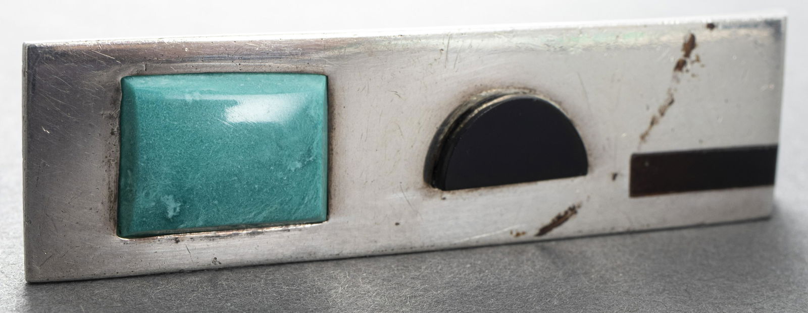 Antonio Pineda Taxco Silver Multi-Stone Inlay Pin: Vintage Antonio Pineda Taxco sterling silver multi-stone; turquoise, onyx and carnelian inlay pin / brooch, marked: "ANTONIO / TAXCO / 970 / HECHO EN MEXICO" with maker's mark and Mexican hallmark, 2.