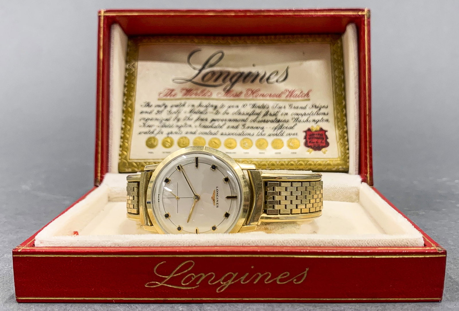 Vintage Longines 10K Gold Filled Wristwatch: Vintage Longines 10K gold filed wristwatch with fancy Kreisler Flex watch gold filled and steel watch strap. Marked on dial: "LONGINES / SWISS". On reverse: "10K GOLD FILLED / USE ALL PROOF 1200 WRENC