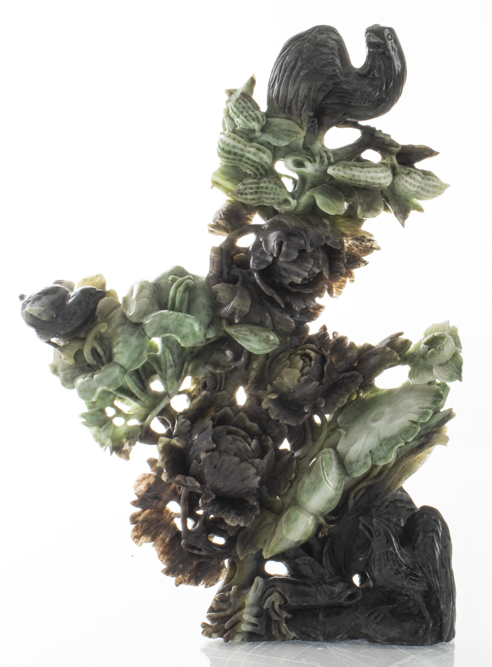 Chinese Carved Jade Flower And Bird Sculpture: Chinese carved jade sculpture of rooster and other birds nestled among floral arrangement. 12.25" H x 9" W x 2.5" D. Scattered chip losses. Provenance: From collectors closing their Hamptons home.