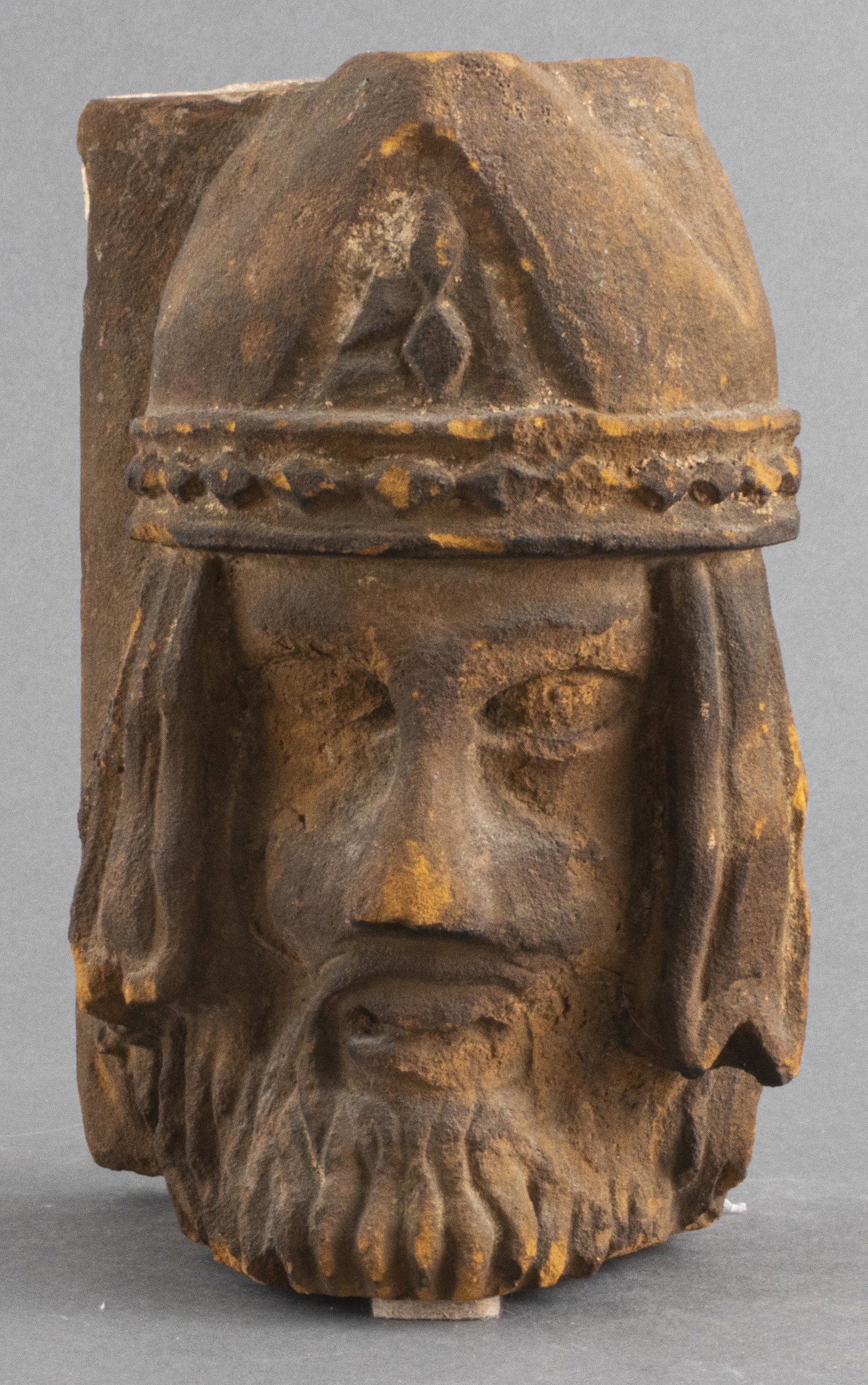 Carved Stone Sculpture of a Head: Carved stone sculpture of a head, possibly depicting a Viking. 9" H x 5.5" W x 4" D.