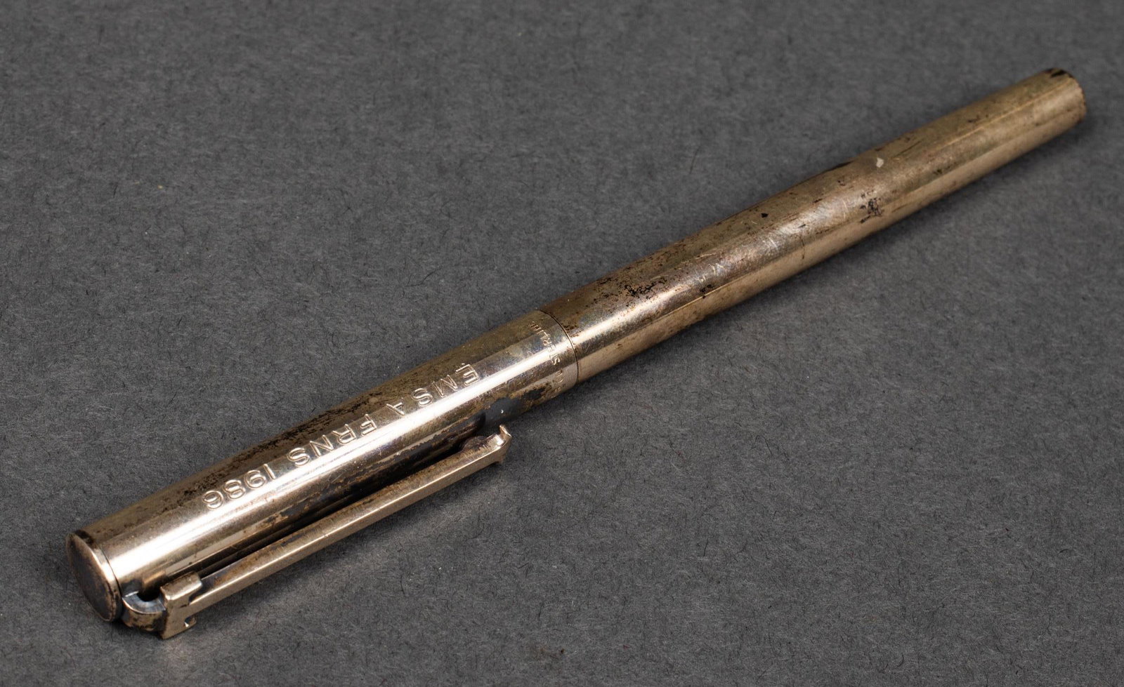 Tiffany & Co. Sterling Silver Pen: Tiffany & Co. sterling silver pen with "T" shirt clip, engraved: "EMSA FRNS 1986," marked: "Tiffany & Co. Sterling." 4.75" L. Not weighable.