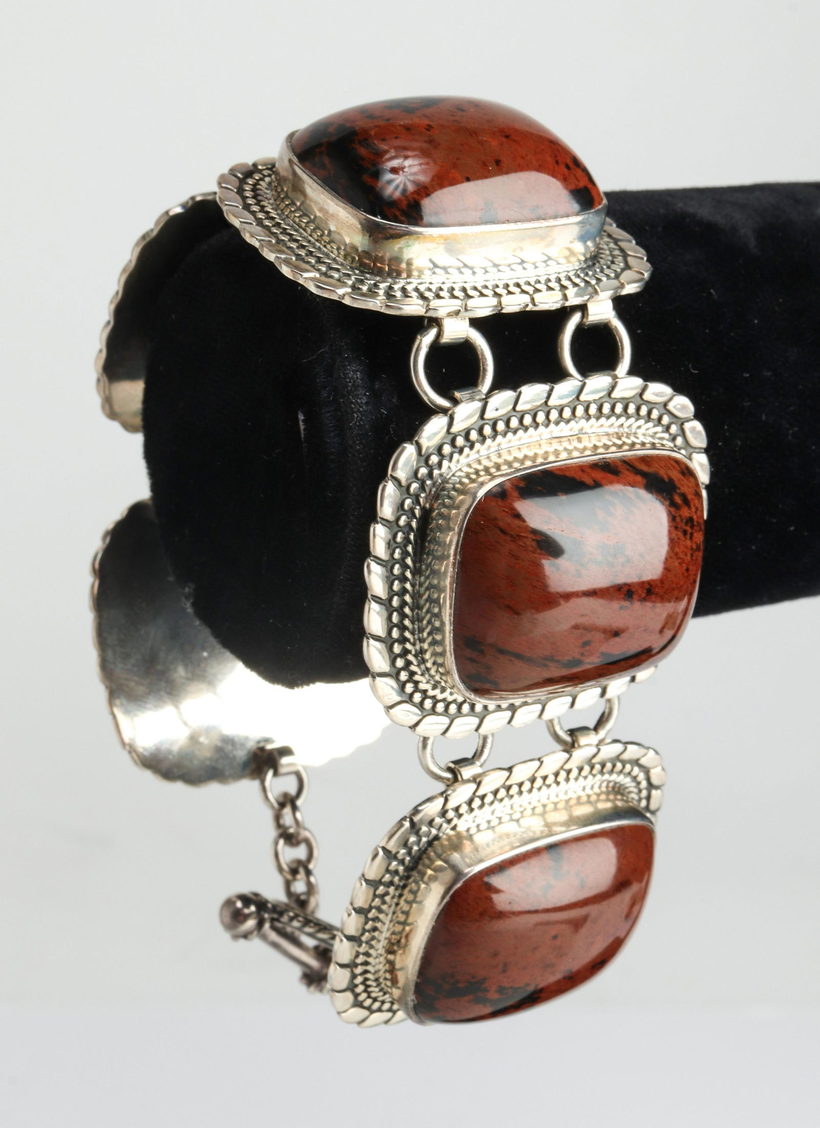Mexican Silver & Jasper Bracelet: Mexican silver and jasper bracelet, comprise of 5 cushion-shaped cabochon bezel set jasper stones approx. 25mm x 20mm, 8.0"L x 1.375"W x 0.5" H. Stamped "ATI/ 925/ MEXICO" . Approx. 3.21 ozt. inclusiv