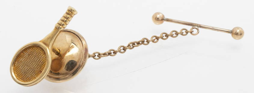 Asprey Of London 18K Yellow Gold Tennis Tie Tack: Vintage Asprey of London 18K yellow gold tennis tie tack, marked: "APLC / 750" with English hallmarks; 0.5" L x 0.75" W. Base with chain marked: "375" with English hallmarks. Approx: 1.9 dwt.