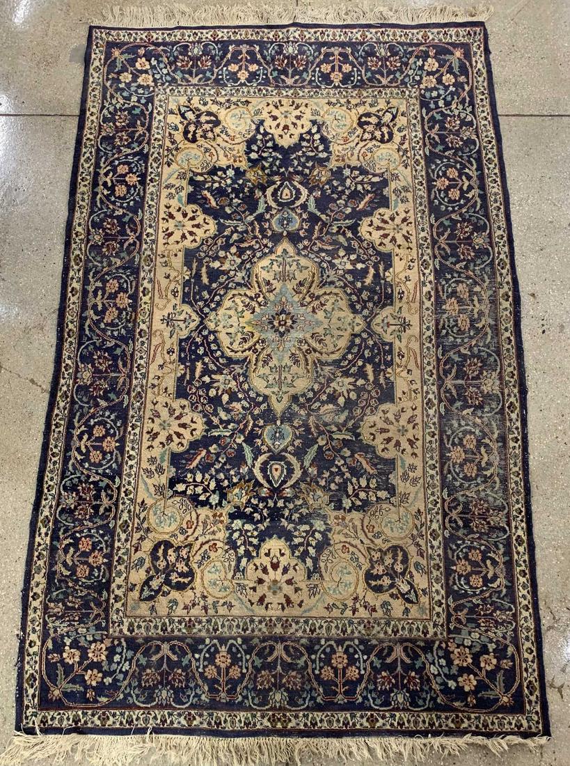 Persian Floral Rug, 7' x 4' 5": Persian floral rug, sand field with navy borders. 85" x 53" worn areas, edge wear.