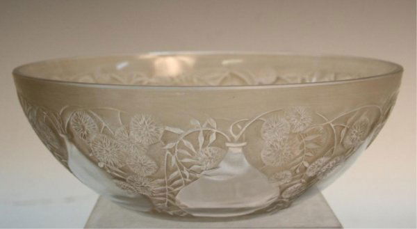French R. Lalique Marcilhac Floral Glass Bowl: Bowl featuring large jugs or vases with stylized flowers flowing out of the mouths in clear glass and backed by frosted glass, by R. Lalique, French, 1921; etched signature on interior bottom of the b