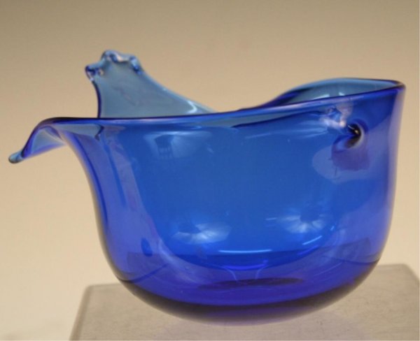 Gunnar Cyren for Orrefors Exposition Glass Bird: Blue bird-shaped dish made for a 1967 Exposition by Gunnar Cyren (Swedish, b. 1931) for Orrefors, glass, ca. 1967; etched signatures and marks on bottom. Dimensions: 3-1/2"H x 5-1/2"L x 4-3/4"W
