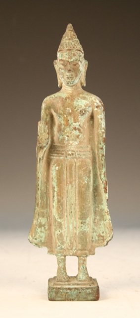 Khmer Bronze Statue of a Monk 18th-19th C.: Khmer statue of a monk in the Angkor-period style showing a spiral in the palm of his raised right hand, bronze, Mekong Delta between Vietnam and Cambodia, ca. eighteenth-nineteenth century; unmarked.