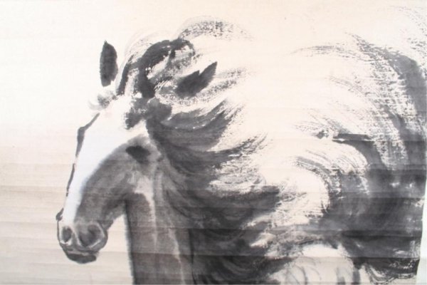 Chinese Scroll Painting of Horse ca. 20th C.: Chinese scroll ink-on-paper painting of a galloping horse, in the style of renowned Chinese artist Xu Beihong (1895-1953); signed and marked with a seal at lower right. Provenance: Private estate in L