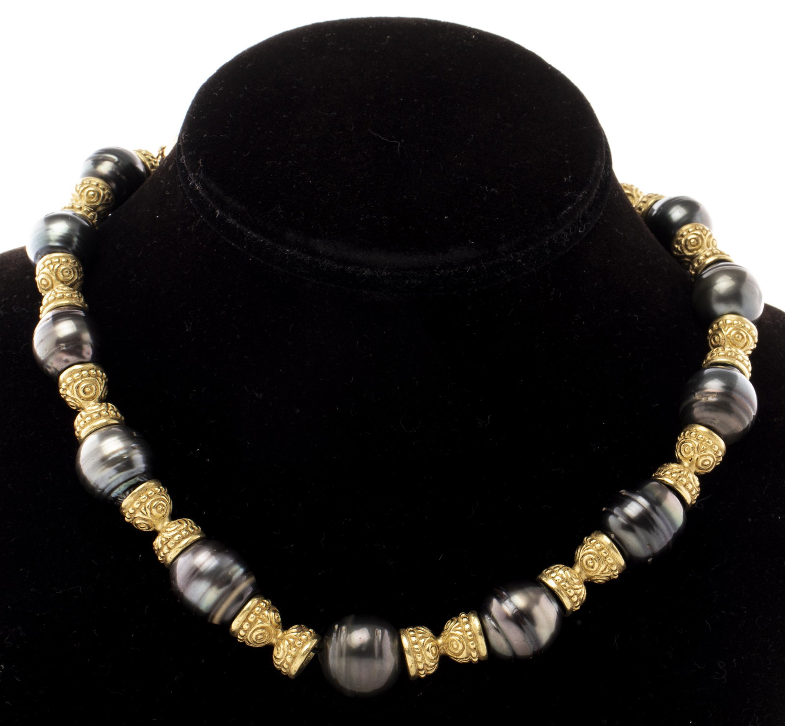 18K Gold & Tahitian Baroque Black Pearl Necklace: Vintage Etruscan Revival 18K yellow gold and Tahitian baroque black pearl graduated necklace with magnetic ball clasp, composed of fourteen baroque pearls, approx: 14 mm to 15 mm. 17.25" L x 0.62" W. 