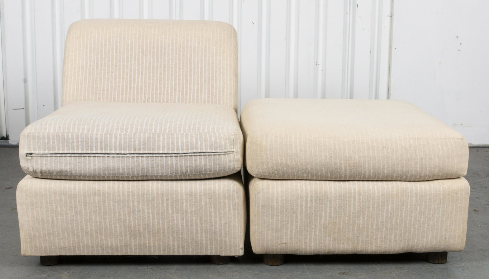 Modern Upholstered Slipper Chair And Ottoman: Modern slipper chair and ottoman with striped upholstery. Chair: 27" H x 26" W x 42" D; ottoman: 17.5" H x 26" W x 27" D.