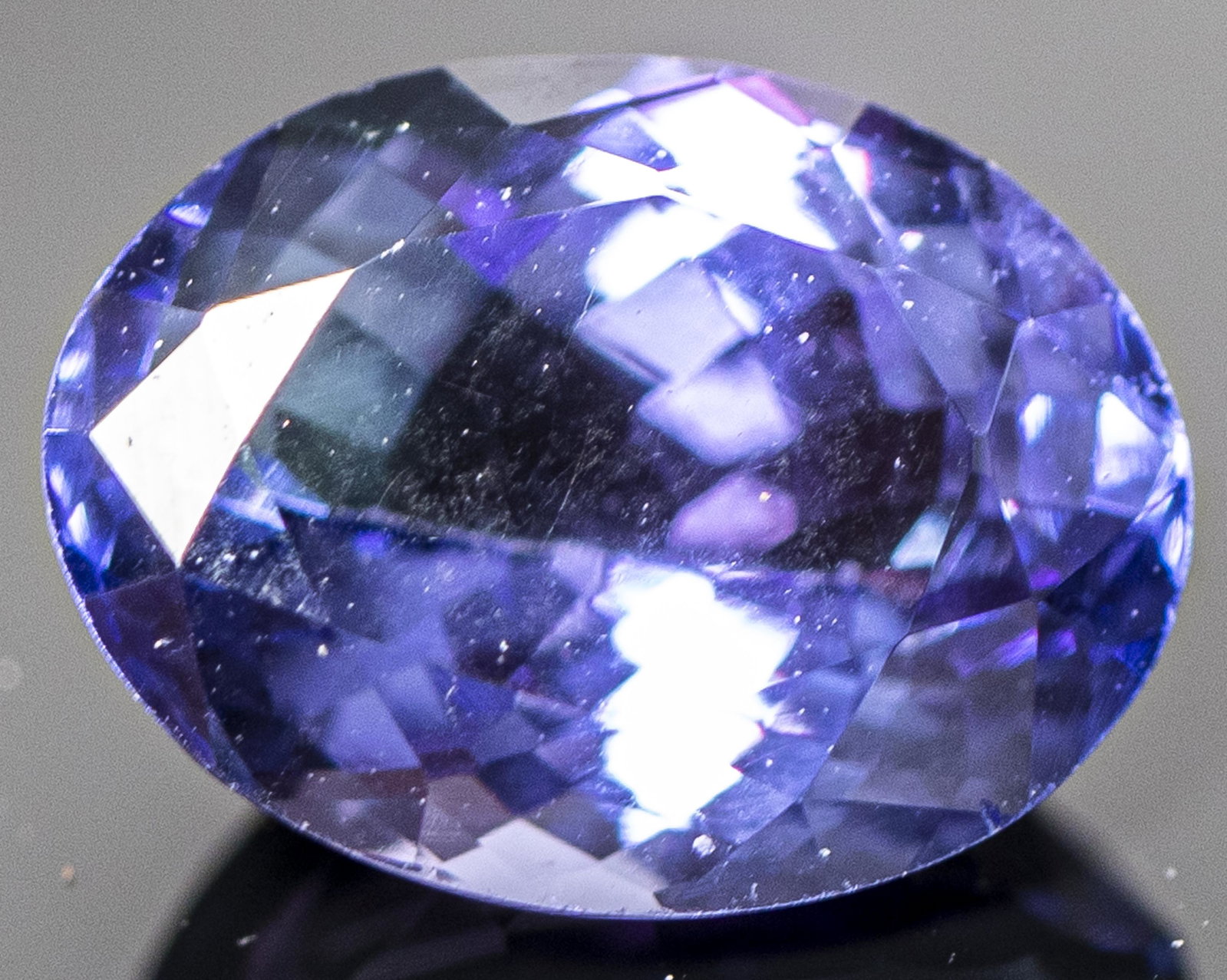 1.60 Ct. Loose Oval-Cut Tanzanite Stone: 1.60 ct. loose oval-cut faceted tanzanite stone. Stone measure 8 x 6 mm.