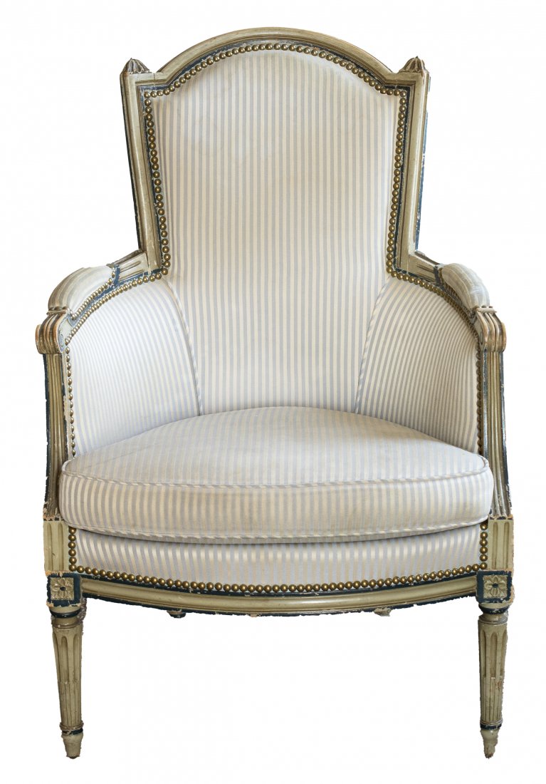 Louis XVI Grey And Blue Painted Bergere Armchair: Louis XVI style grey and blue painted bergère, late 19th / early 20th century, the carved frame with floral and rosette motifs around the upholstered seats, raised on tapered fluted legs. 38" H x 27"
