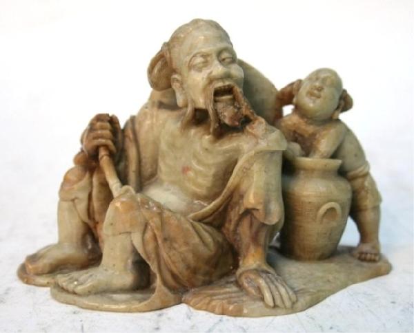 Chinese Soapstone Carving of Old Man & Boy 19th C: Soapstone carving of elderly with young boy, China, nineteenth century; unmarked. Dimensions: 2-3/4"L x 4-1/8"W x 2"D