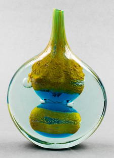 Michael Harris Attr. Mdina Art Glass "Fish" Vase: Michael Harris attr. Mdina art glass "Fish" vase, of bottle form in clear glass internally decorated with yellow and blue glass, unsigned. 7.25” H x 5.5” W x 2” D.